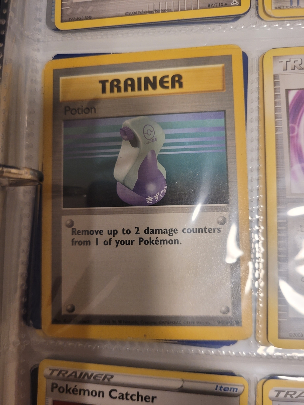 Pokemon Trainer Potion Card - Yellow Border with Purple Artwork